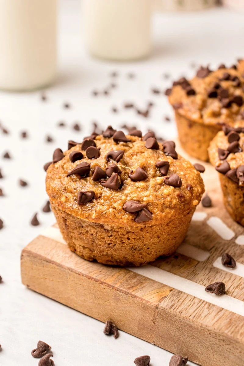 low fat banana chocolate chip muffin on a cutting board