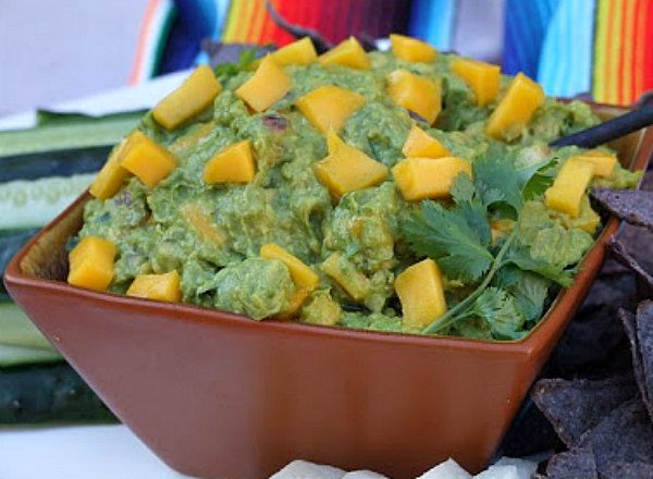 Mango Guacamole recipe from RecipeGirl.com #mango #guacamole #recipe #RecipeGirl Mango Guacamole in a bowl