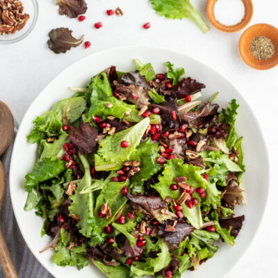 serving of mixed greens pomegranate salad