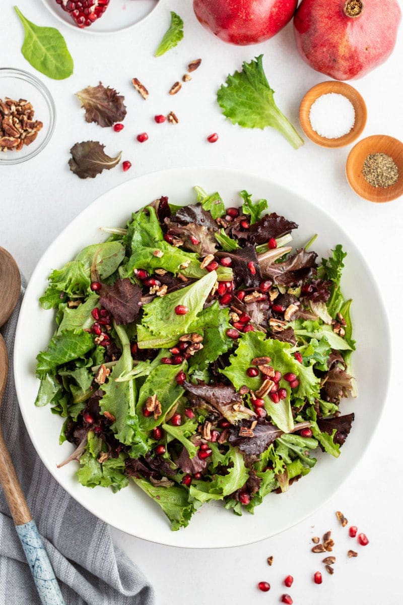 serving of mixed greens pomegranate salad