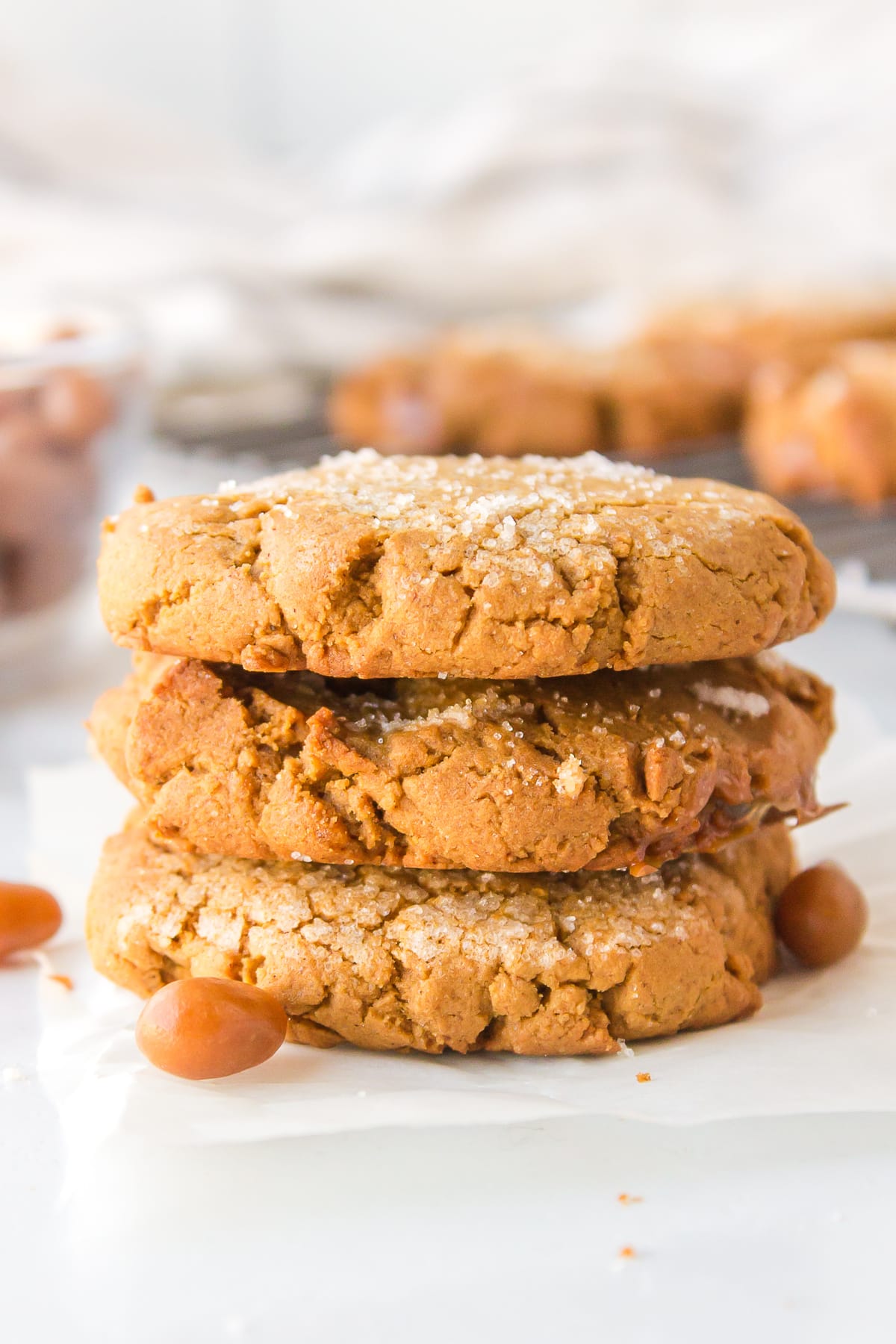 stack of three molasses cookies with sugar babies