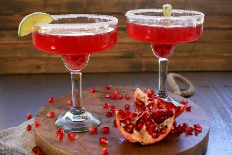 two pomegranate margaritas