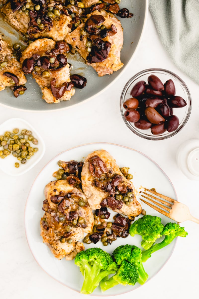 individual serving of pork with olive caper sauce