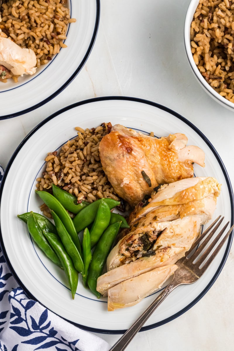 chicken with beans and rice on a plate