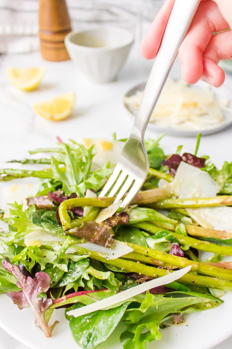 fork poking into salad