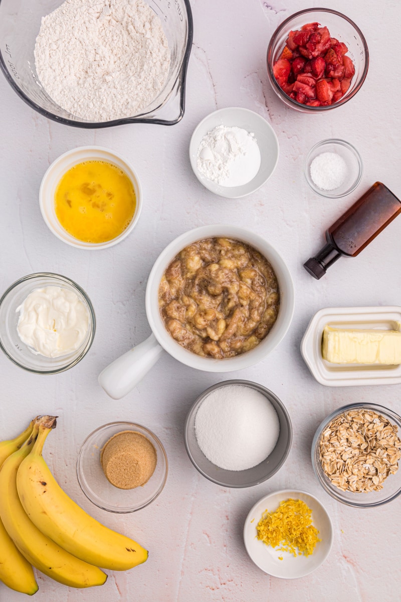 ingredients displayed for making strawberry oatmeal banana bread