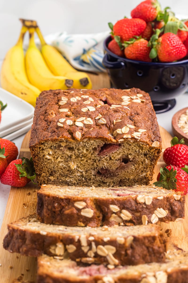 loaf of strawberry oatmeal banana bread sliced open