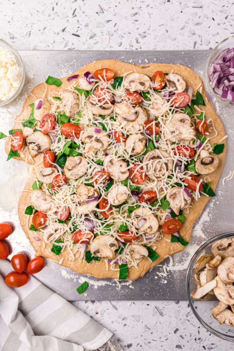 whole wheat pizza dough topped with toppings