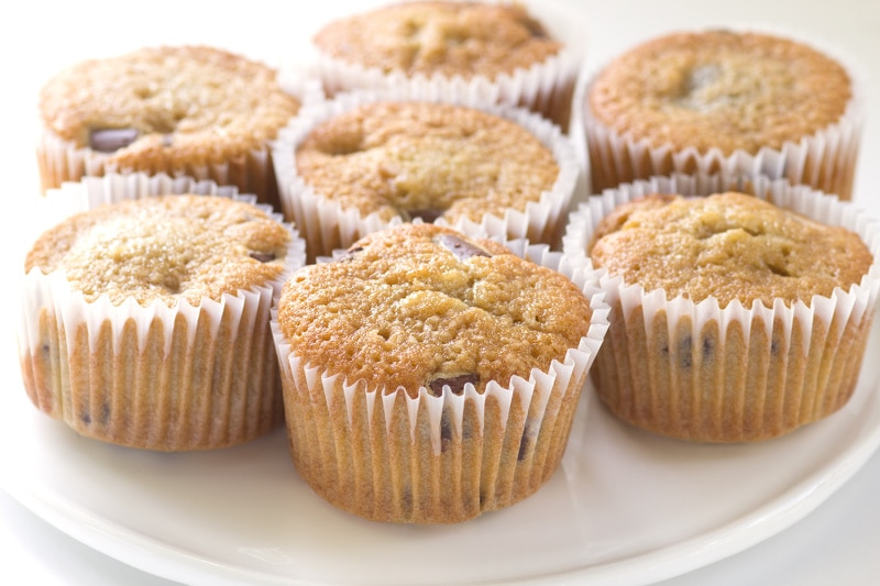 several chocolate chunk cookie cupcakes on a white platter