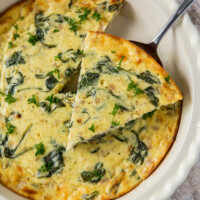slicing crustless spinach and cheese quiche