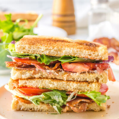 best blt sandwich cut in half and stacked on plate