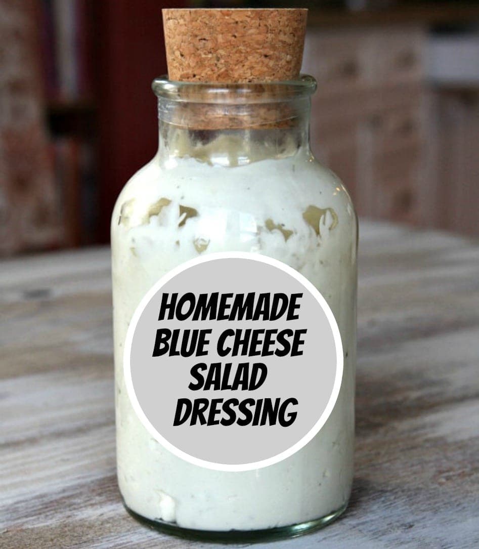 blue cheese salad dressing in a bottle with a cork.