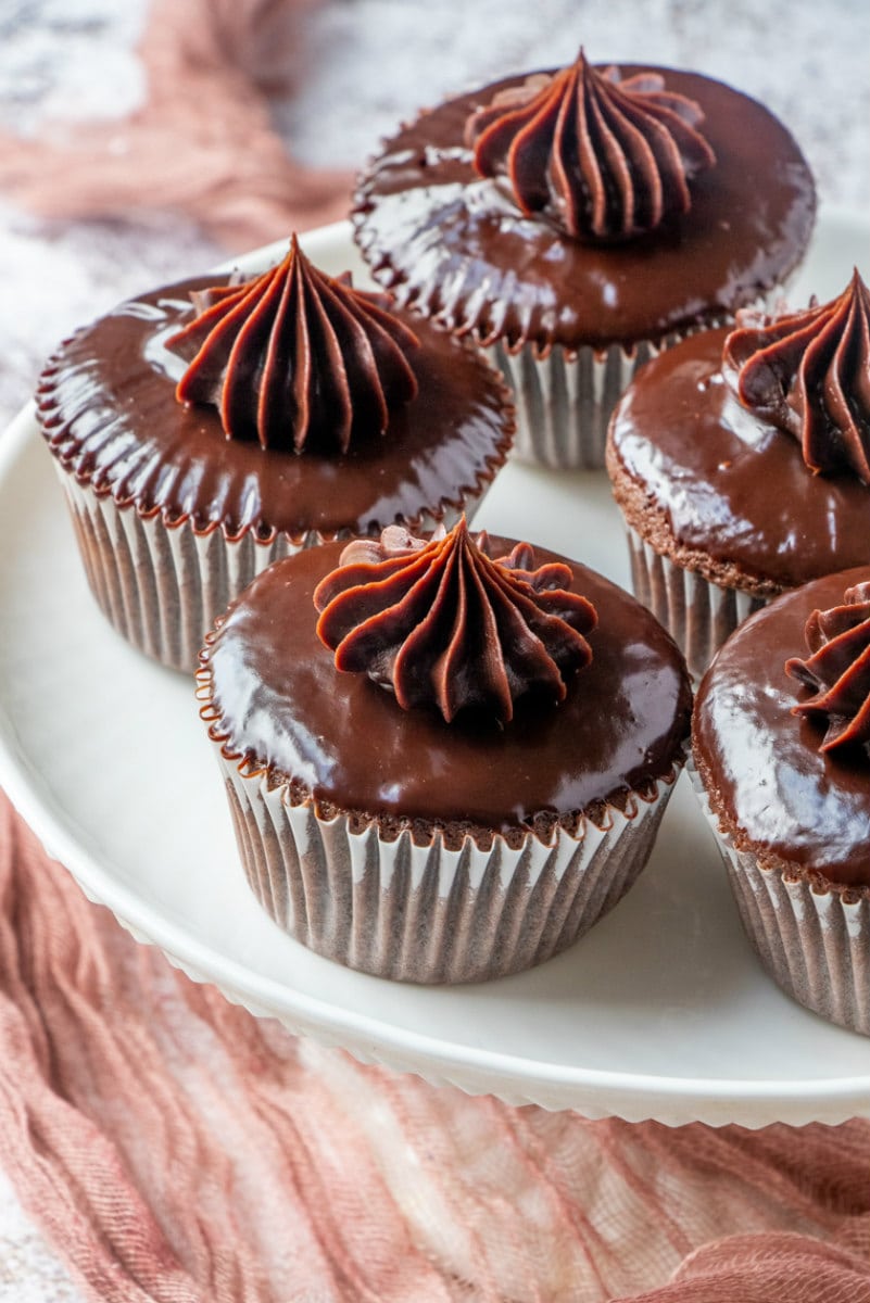 platter of chocolate ganache cupcakes