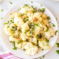 cauliflower with capers in a white dish