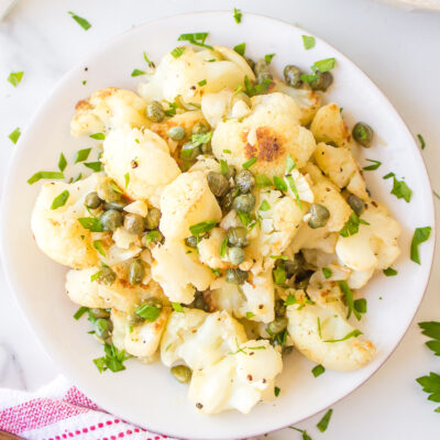 cauliflower with capers in a white dish