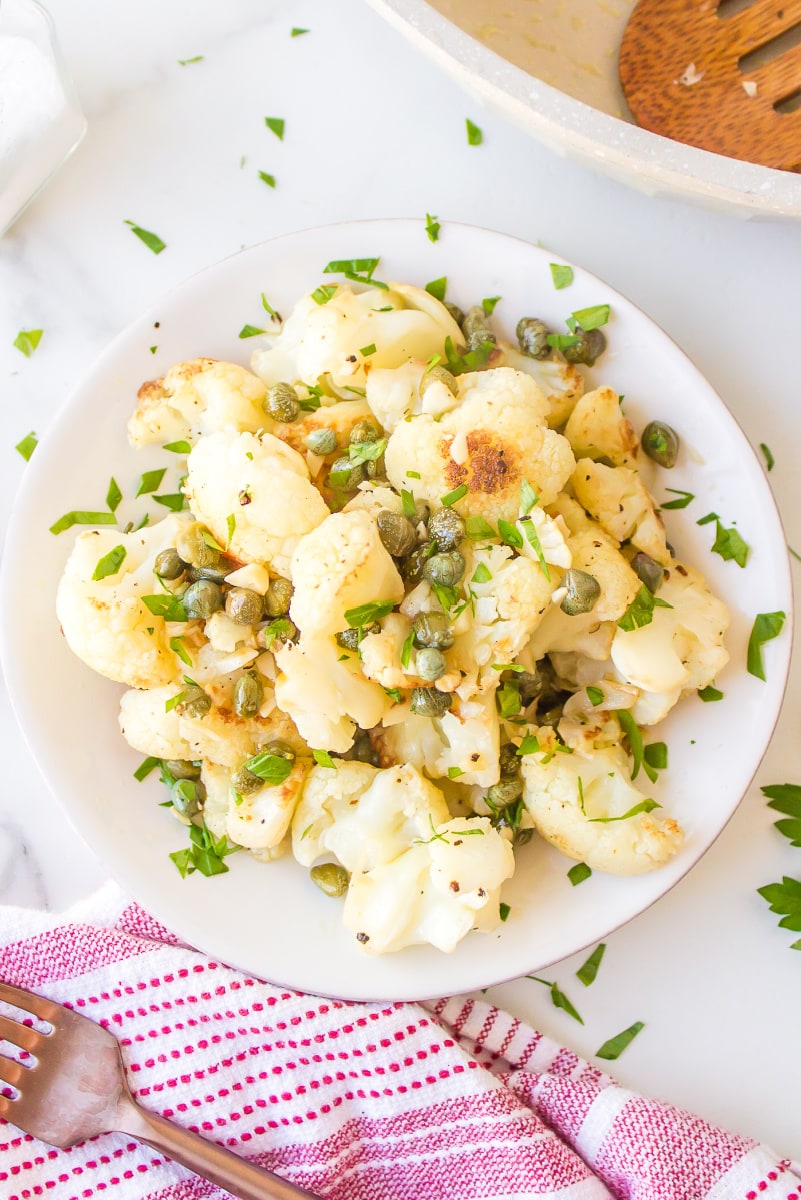 cauliflower with capers in a white dish