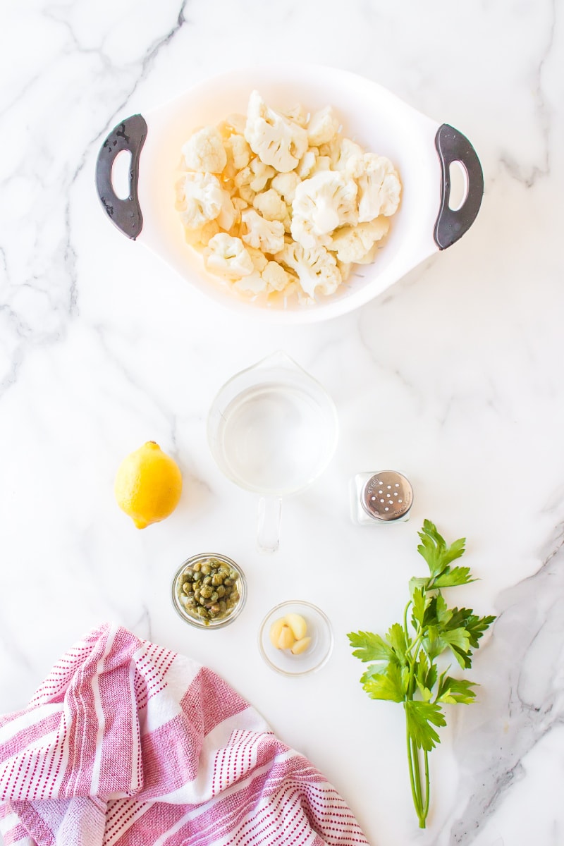 ingredients displayed for making cauliflower with capers