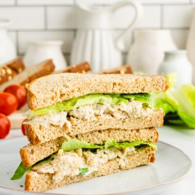 chicken salad sandwich cut in half and stacked