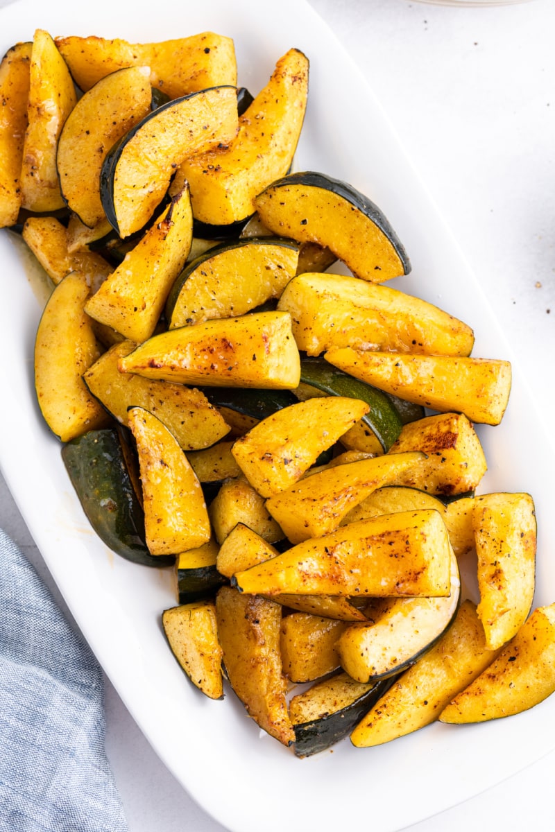 chili roasted acorn squash on white platter