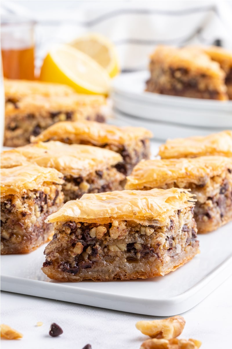 chocolate baklava on a white platter