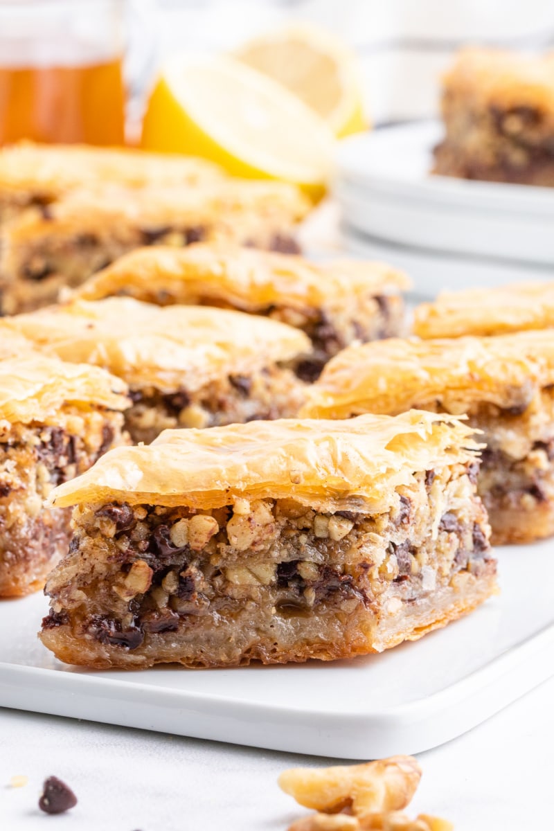 pieces of chocolate baklava on a white platter