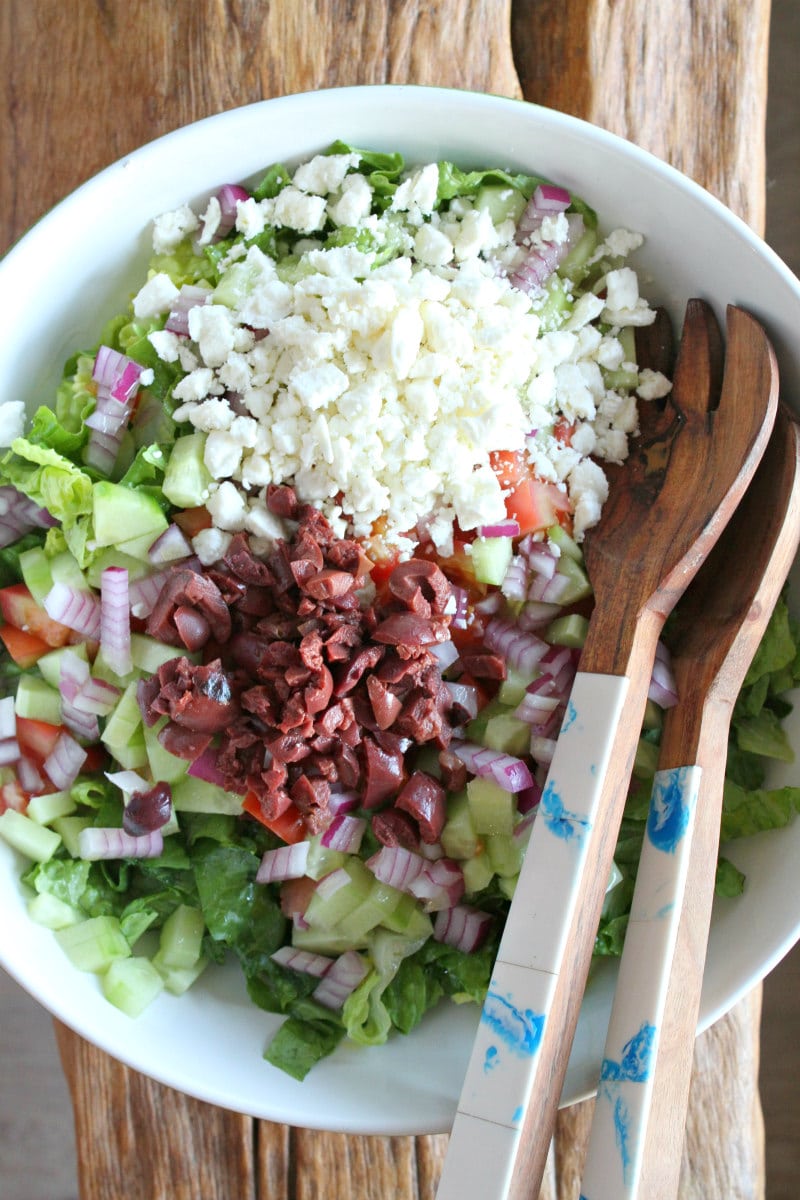 Chopped Vegetable Salad with Feta and Olives in a bowl