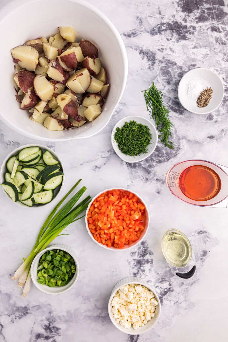 ingredients displayed for making dill potato salad with feta