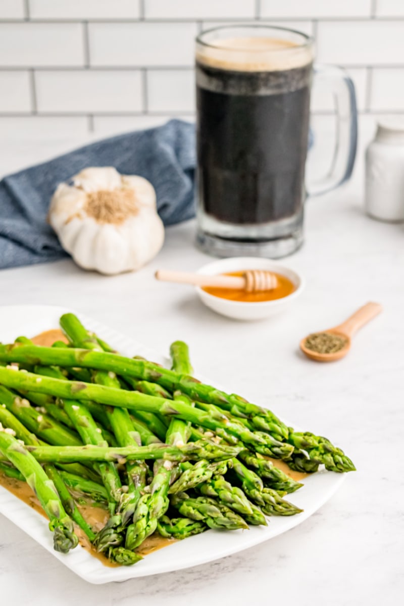 drunken asparagus on serving platter