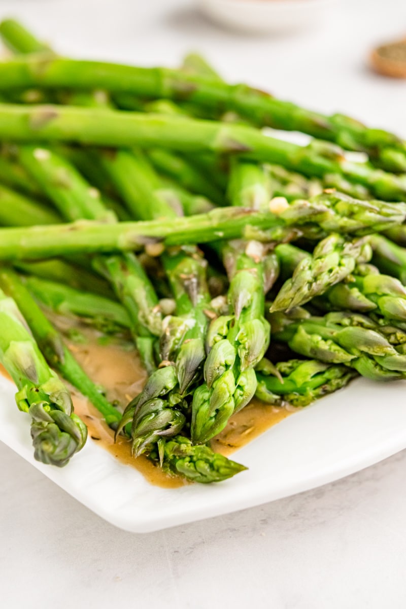 close up asparagus on serving platter
