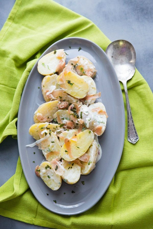 Fingerling Potato and Prosciutto Salad on a blue plate