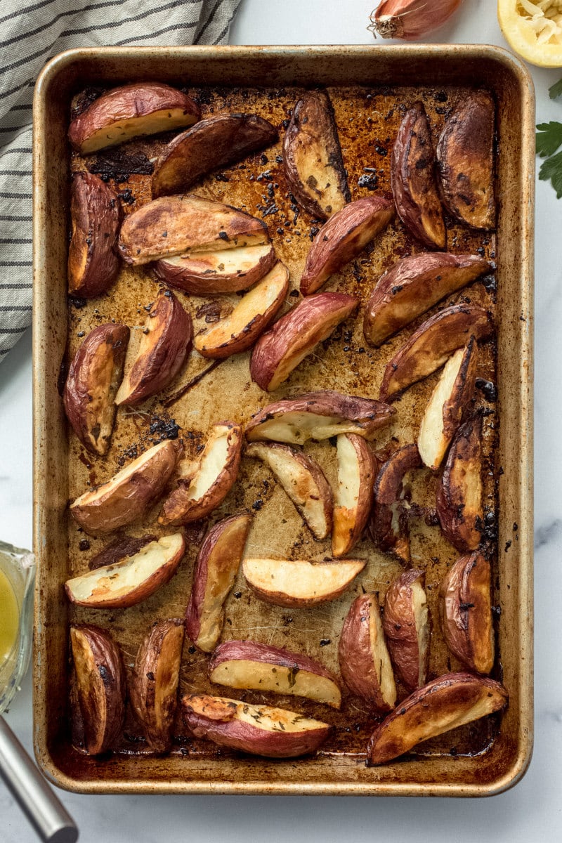 potato wedges on a baking sheet