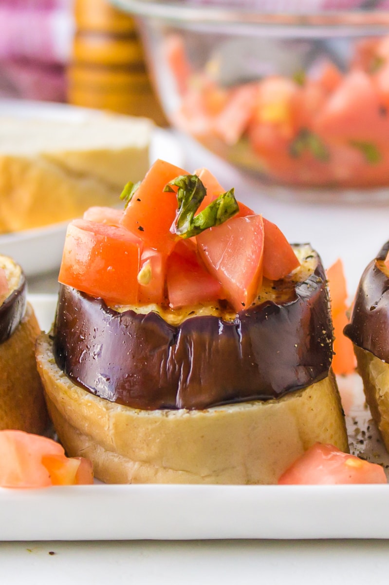 close up grilled eggplant open faced sandwiches