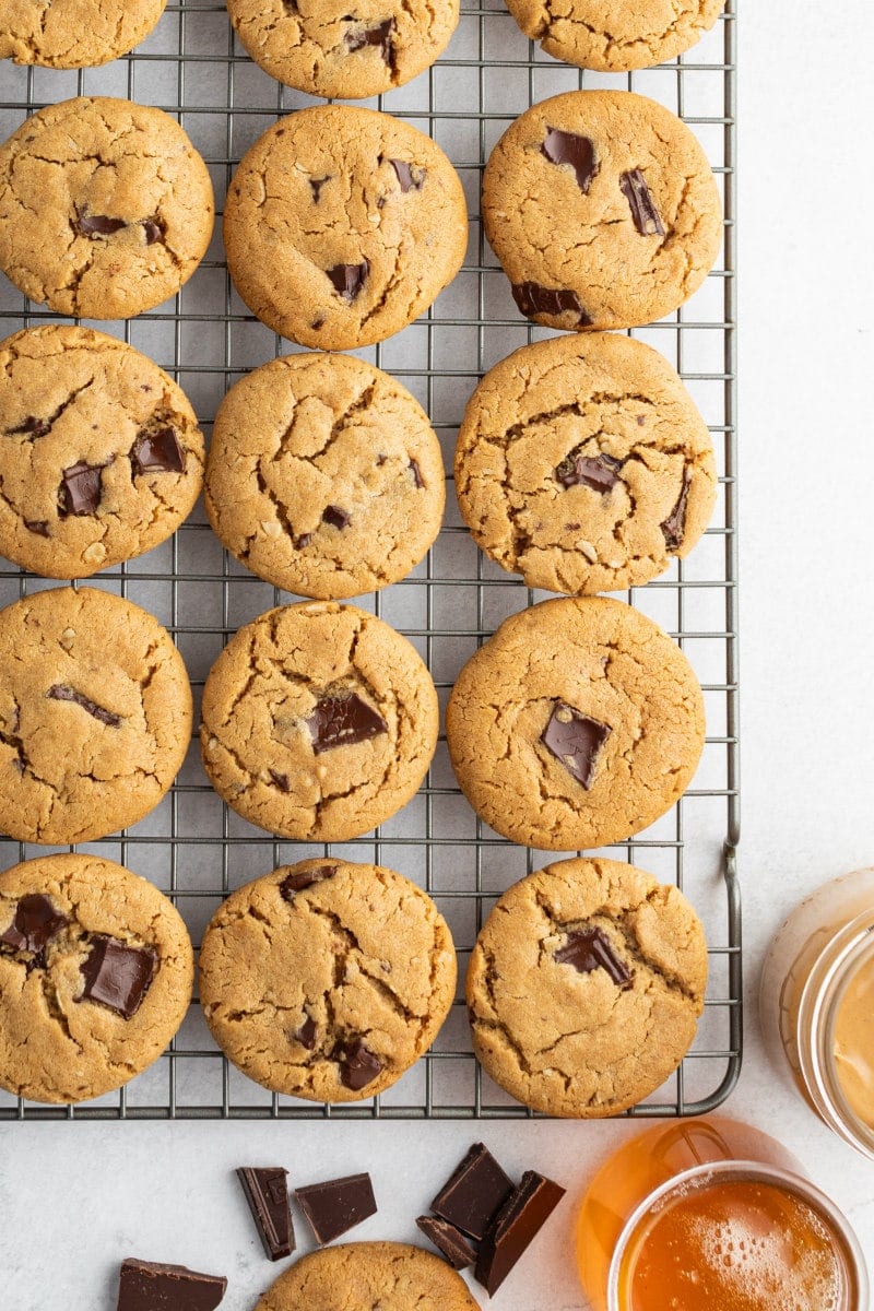 honey peanut butter chocolate chunk cookies on a cooling rack