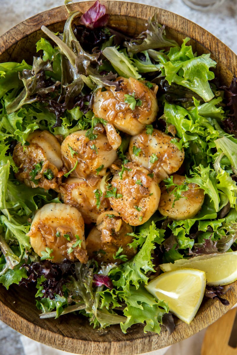 Lemon Scallops served over greens