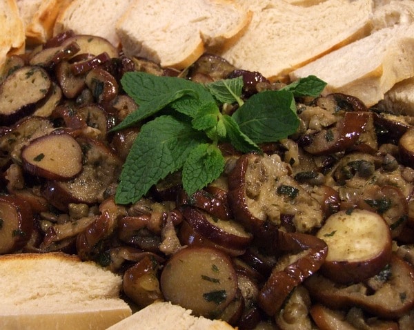 Marinated Eggplant appetizer with capers and mint recipe from RecipeGirl.com #marinated #eggplant #appetizer #recipe #RecipeGirl #capers #mint #greek Marinated Eggplant served with baguette