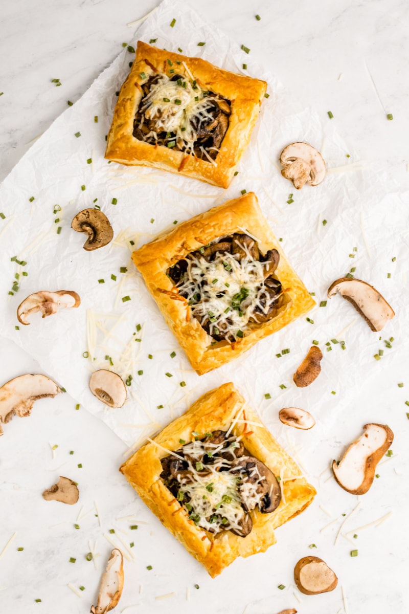 three mushroom and cheese tarts