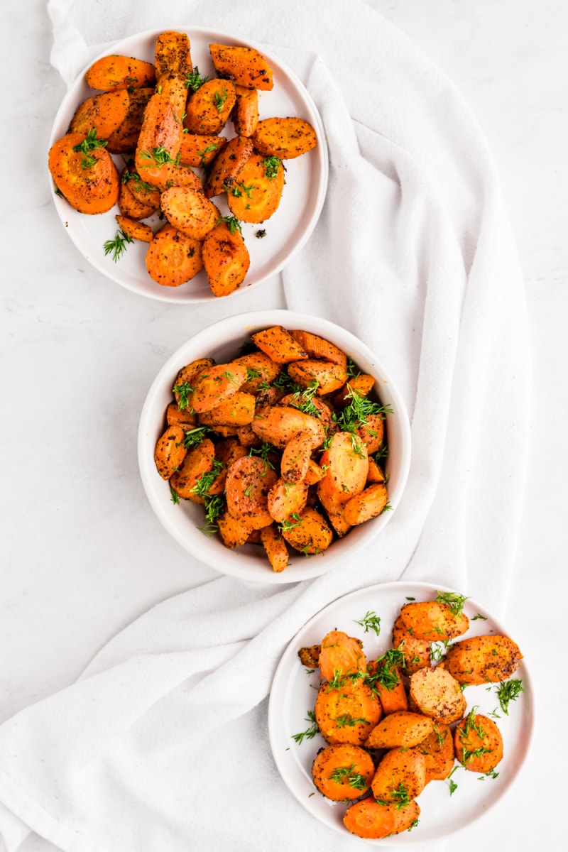 three servings plated roasted carrots