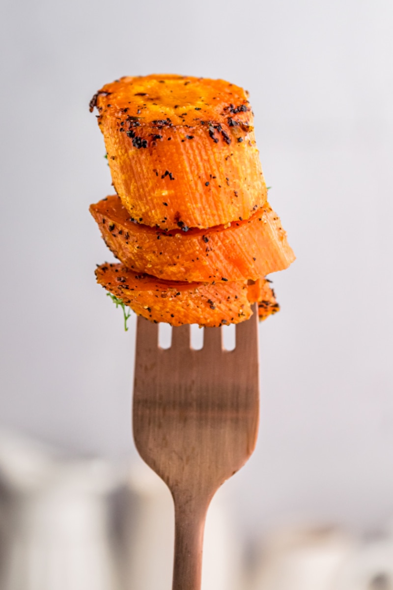 fork full of roasted carrots