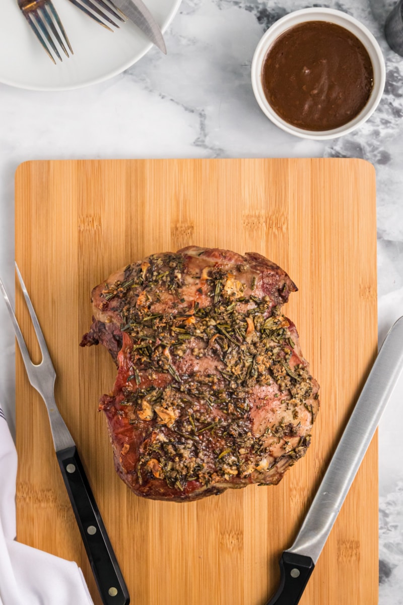 roasted lamb on a cutting board