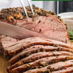 pinterest image for leg of lamb roast with garlic and rosemary
