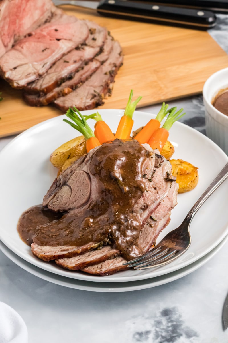 plated roasted lamb with gravy