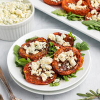 roasted tomatoes with stilton on a plate