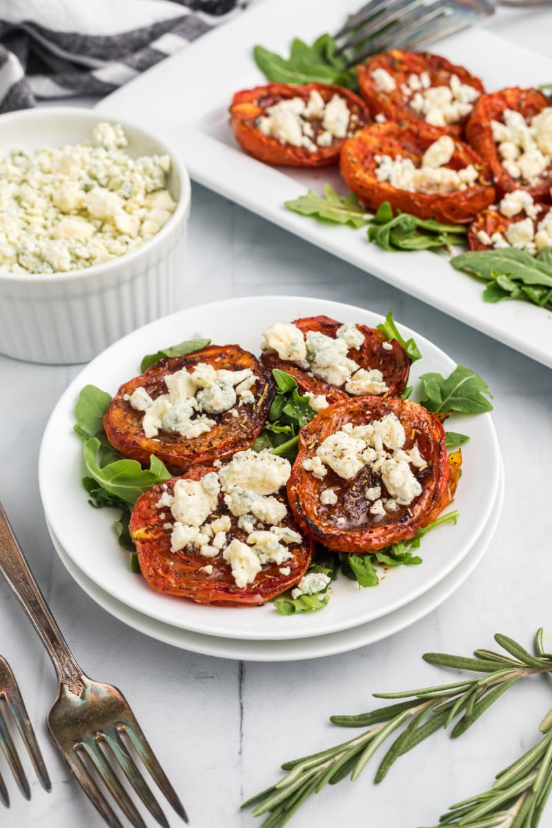 roasted tomatoes with stilton on a plate