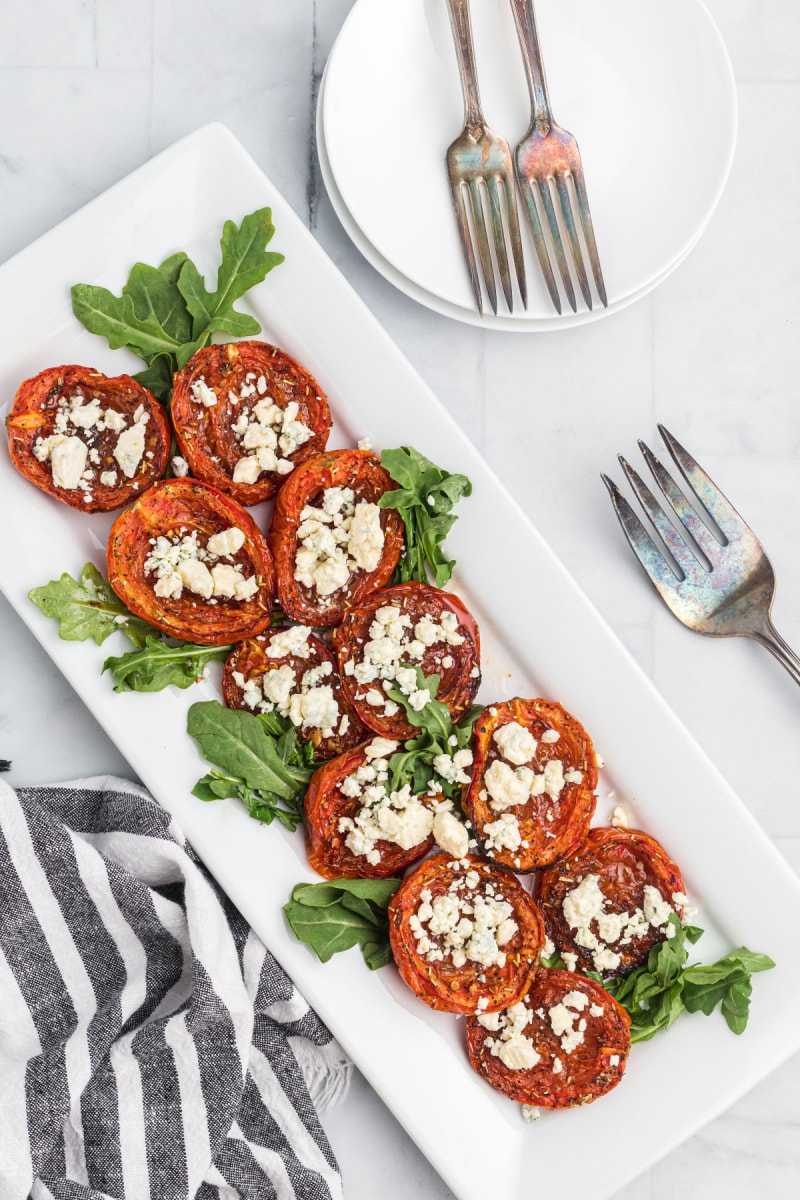 roasted tomatoes with stilton displayed on a platter