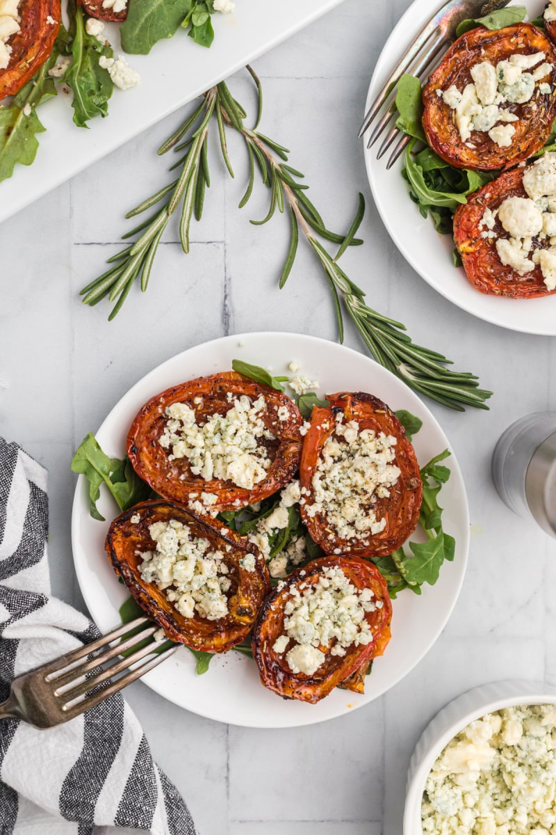 roasted tomatoes with stilton on a plate