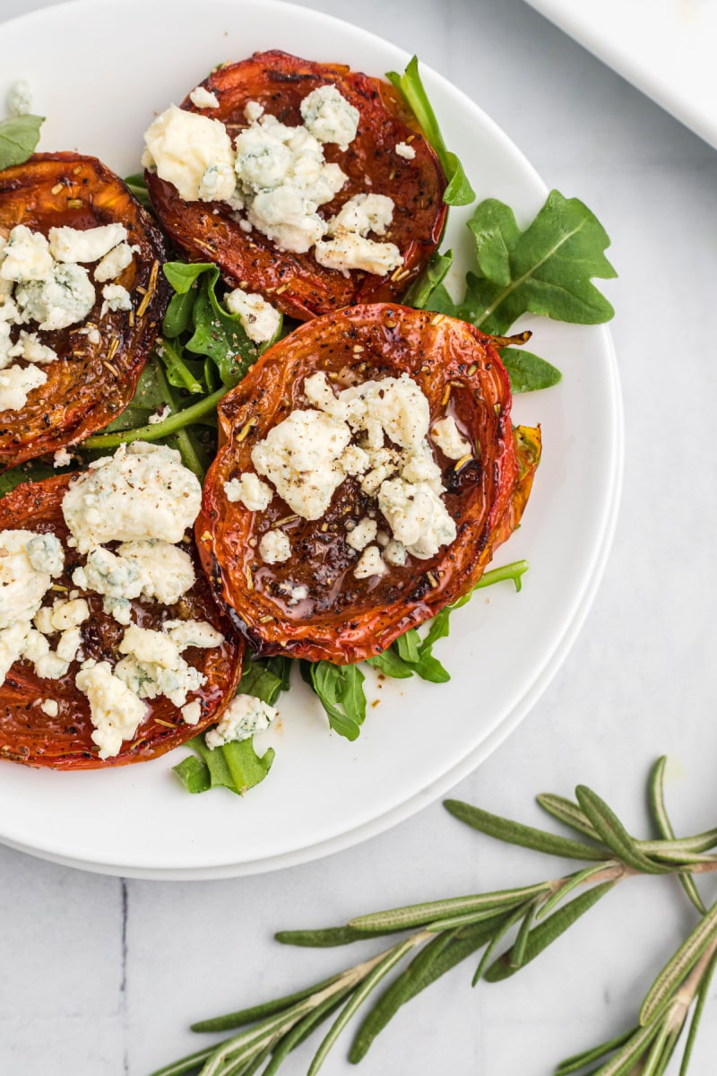 roasted tomatoes with stilton on a plate
