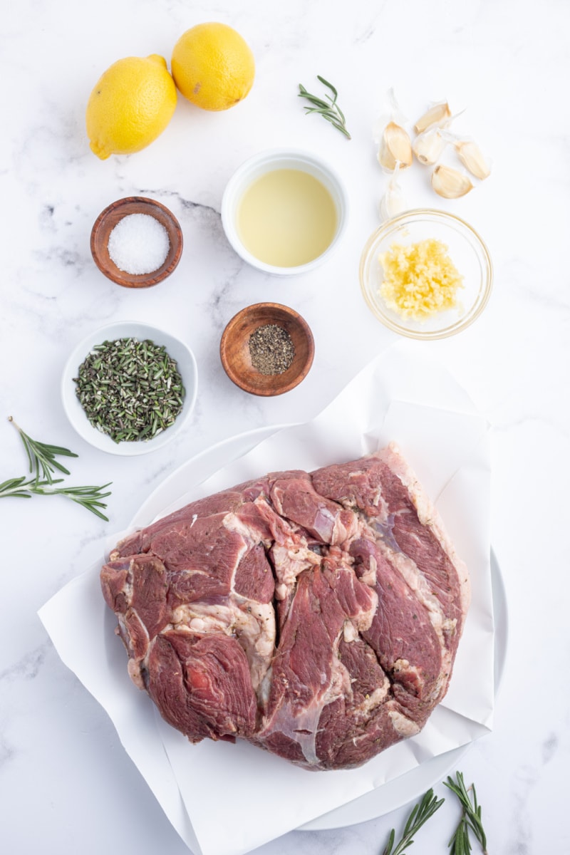 ingredients displayed for making rosemary and garlic leg of lamb roast