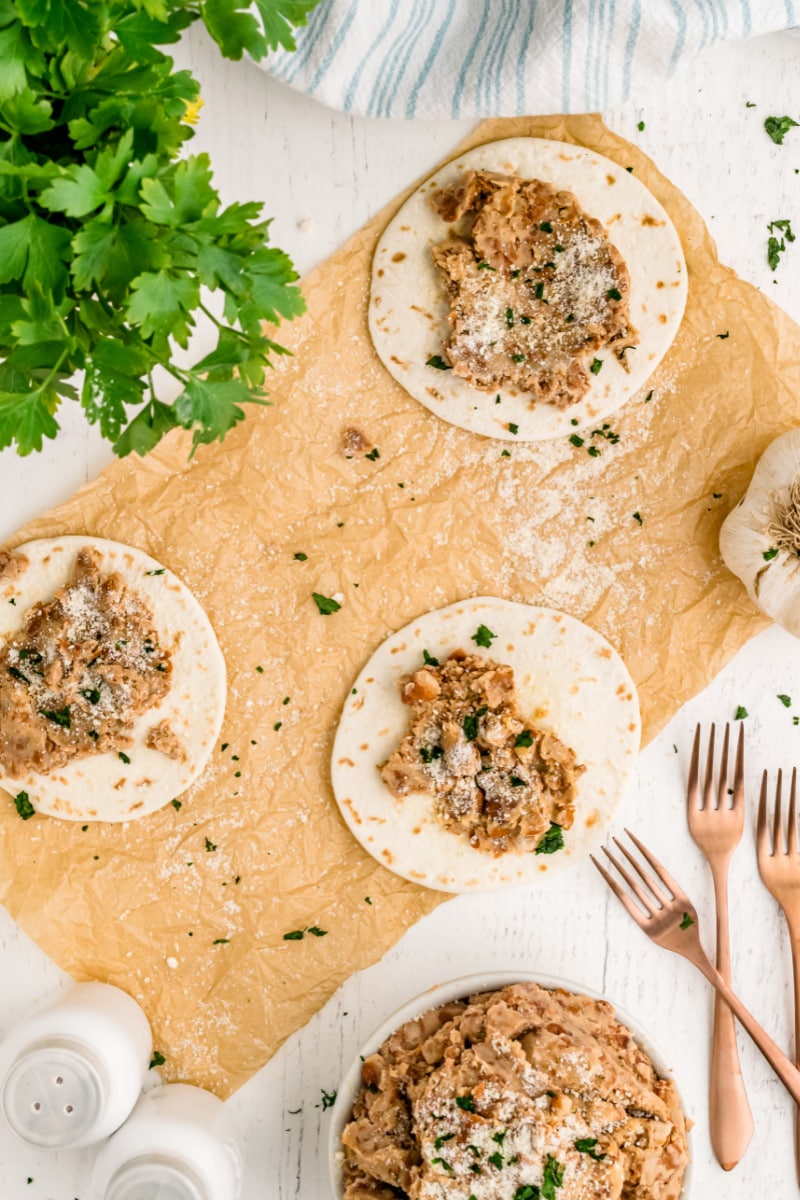 rubios pinto beans on tortillas