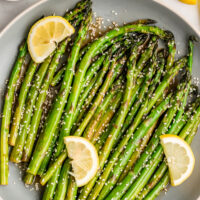 sesame asparagus with lemon on a plate