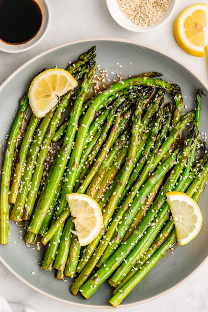 sesame asparagus with lemon on a plate